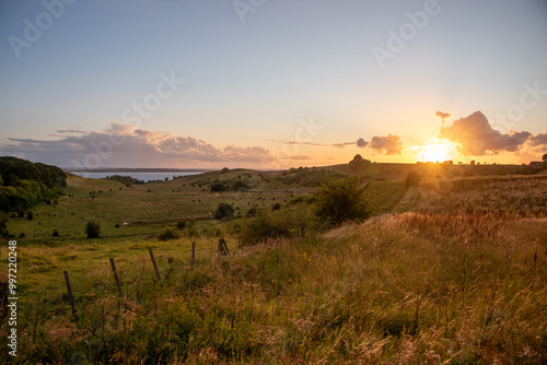 Scenic landscape at Glumslövs Backar / Hilleshögs Dalar nature reserve in Sweden at sunset.