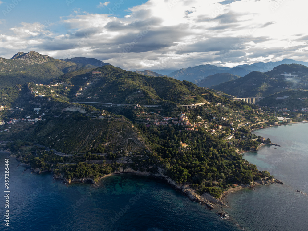 Aerial view on Italian Riviera and Mediterranean Sea from French-Italian border in Grimaldi village, Ventimiglia near San-Remo, travel destination, panoramic view from above Aerial view on Italian Riviera and Mediterranean Sea from French-Italian border in Grimaldi village, Ventimiglia near San-Remo, travel destination, panoramic view from above