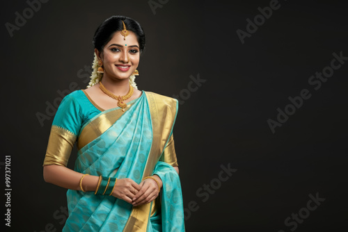 Beautiful gorgeous young indian woman in traditional saree