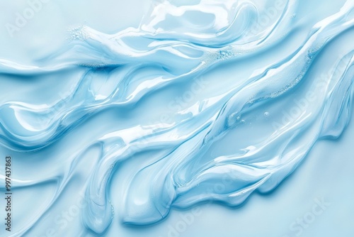 Elegant close-up of transparent gel with wave-like swirls on a matte surface for cosmetic product advertising