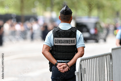 Fototapeta Naklejka Na Ścianę i Meble -  Illustration picture showing a male police officer (man) with uniform from gendarmerie ensuring security in Paris, France on September 26, 2024. French national policeman in action.