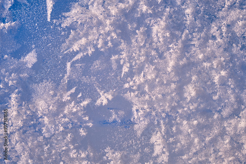 Background of winter ice and snow texture. Ice covered by frost naturl background photo