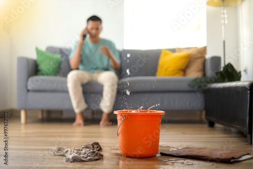Emergency Roof Leaking Damage Water Leak Or Flood From Ceiling at Living Room
