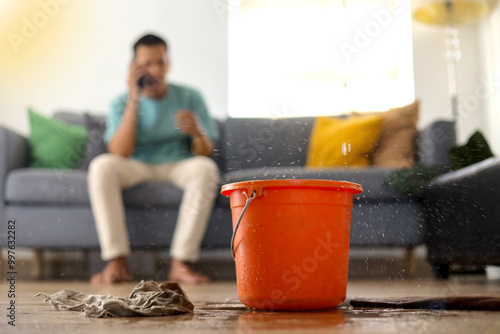 Emergency Roof Leaking Damage Water Leak Or Flood From Ceiling at Living Room
