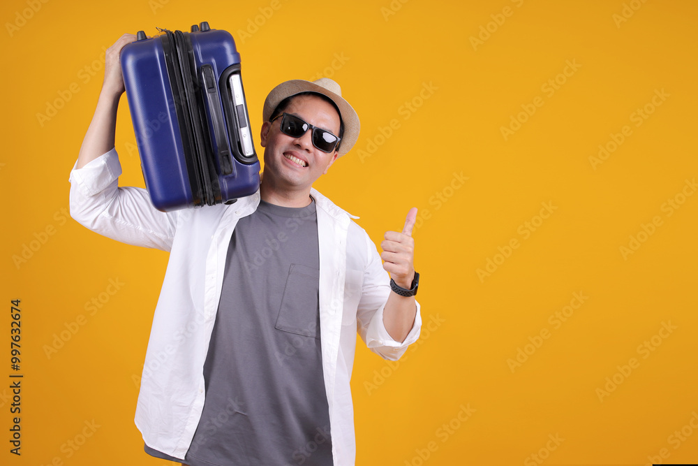 Traveller Man Wear Summer Clothes Carrying Bag on Shoulder and Giving Thumb up With Copy Space Traveller Man Wear Summer Clothes Carrying Bag on Shoulder and Giving Thumb up With Copy Space