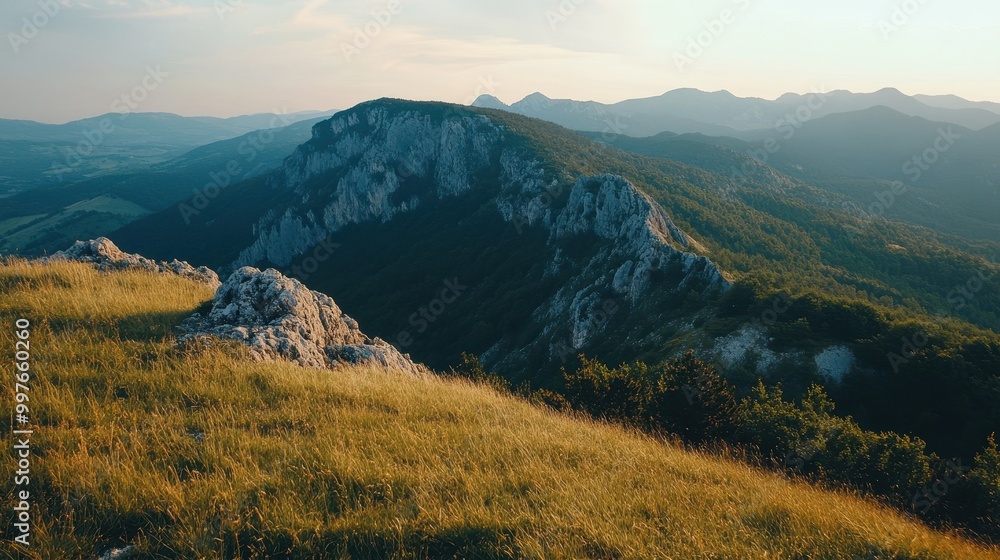 Mountainous Landscape with Grassy Ridge and Distant Peaks Mountainous Landscape with Grassy Ridge and Distant Peaks