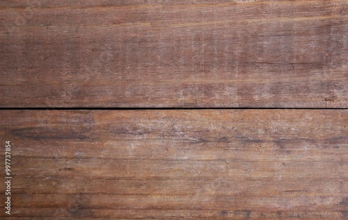 Textured wooden backdrop made of rustic brown planks background