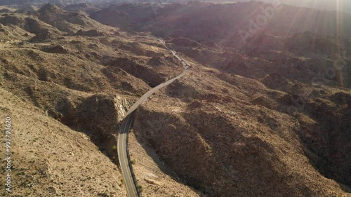 Desert hills and roads during sunset in Palm Desert, California