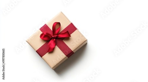 A neatly wrapped gift with a red ribbon on a plain white background, symbolizing celebration, generosity, or a special occasion.