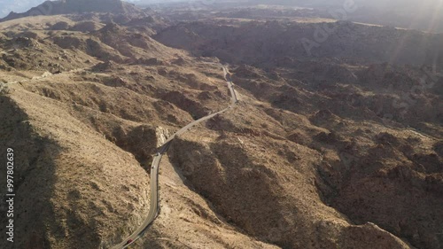 Desert hills and roads during sunset in Palm Desert, California