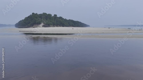 Drone flies low over Rio Negro river to Praia do Meio photo