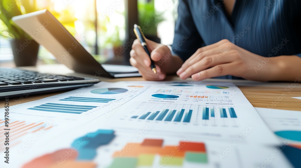 Financial advisor helping a client with tax optimization strategies, using charts and financial tools to maximize savings Financial advisor helping a client with tax optimization strategies, using charts and financial tools to maximize savings