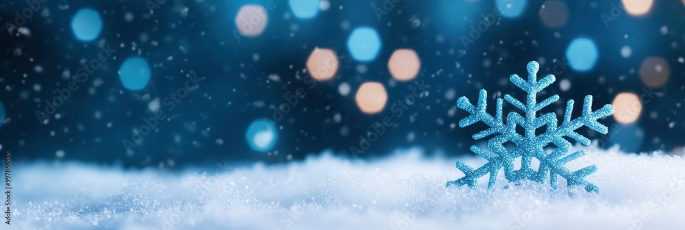 Snow with a Christmas blue backdrop Snow with a Christmas blue backdrop