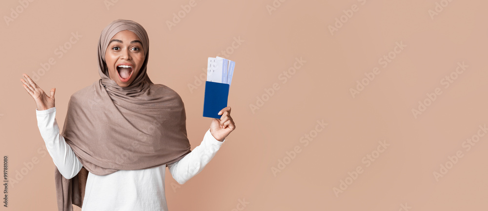 Hot Tours Concept. Overjoyed Black Muslim Girl Holding Passport With Tickets And Emotionally Rejoicing Success, Yellow Background With Copy Space Hot Tours Concept. Overjoyed Black Muslim Girl Holding Passport With Tickets And Emotionally Rejoicing Success, Yellow Background With Copy Space