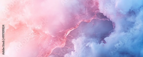 A dreamy, abstract image featuring swirling clouds in soft shades of pink and blue, evoking a sense of calm and imagination.