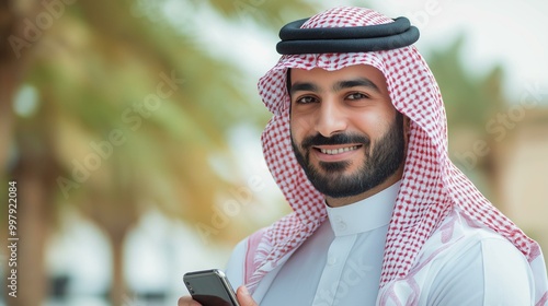 portrait of saudi businessman talking on phone