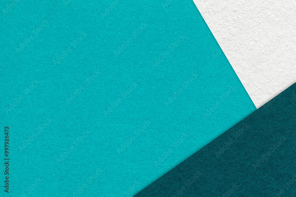 Texture craft turquoise paper background with white and emerald border. Vintage abstract cerulean cardboard. Texture craft turquoise paper background with white and emerald border. Vintage abstract cerulean cardboard.