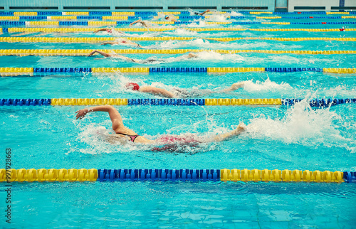 Turquoise swimming pool lanes, a symbol of sport