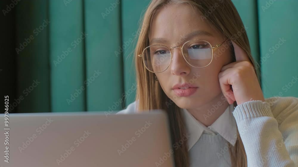 Closeup portrait of smiling businesswoman working at modern office and using computer touchscreen, looking at monitor. Closeup portrait of smiling businesswoman working at modern office and using computer touchscreen, looking at monitor.