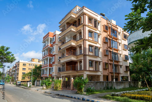 Residential multistory apartment buildings with city road at Rajarhat area of Kolkata, India.