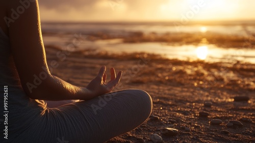 A serene figure meditates by the ocean at sunset, embodying peace and tranquility amid warm golden hues and gentle waves.