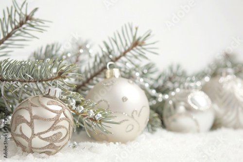 White Christmas ornaments on pine branches