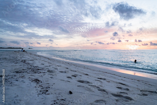 Sunset beach in Thulusdhoo, Maldives