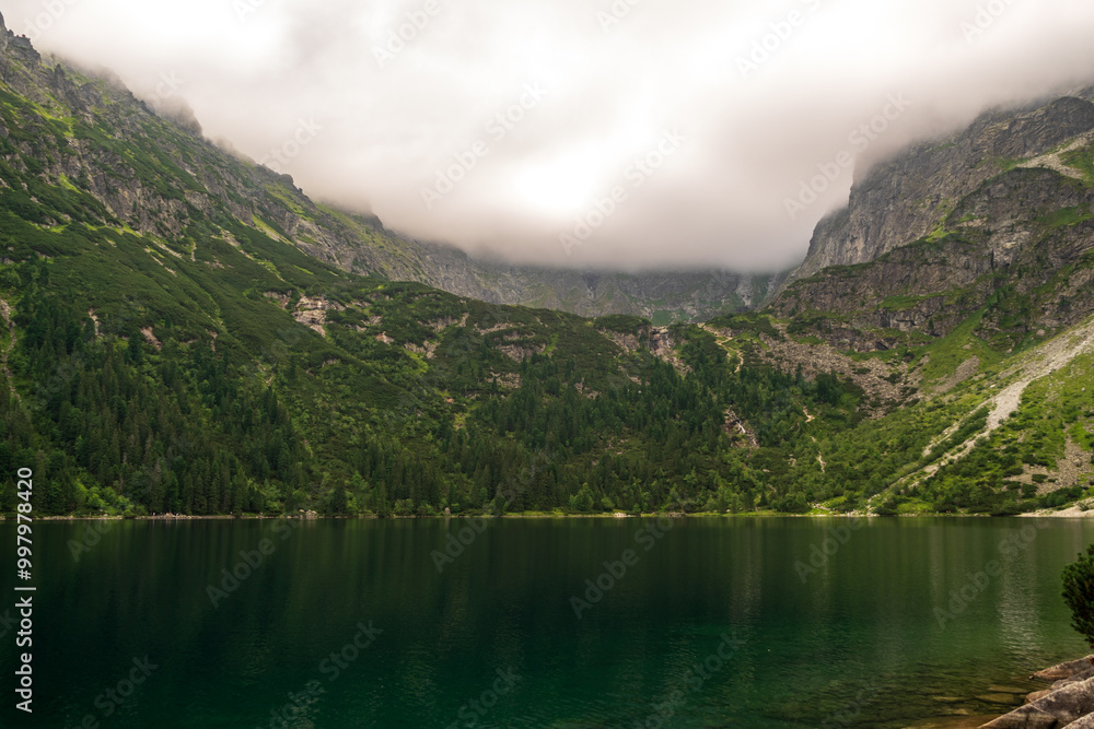 Alpine lake landscape, Morskie Oko or Sea Eye in high Tatras mountain of Tatra national park, Poland Alpine lake landscape, Morskie Oko or Sea Eye in high Tatras mountain of Tatra national park, Poland