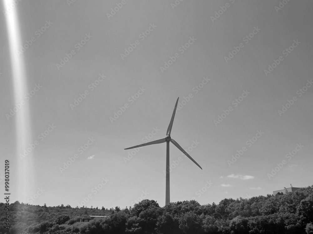 Wind power plant rotor, green eco energy concept, black and white monochrome grayscale Wind power plant rotor, green eco energy concept, black and white monochrome grayscale
