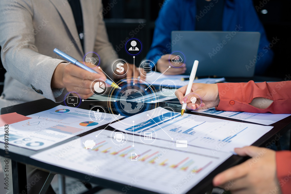 financial asian advisor showing plan of investment to clients in the consultancy office. financial asian advisor showing plan of investment to clients in the consultancy office.
