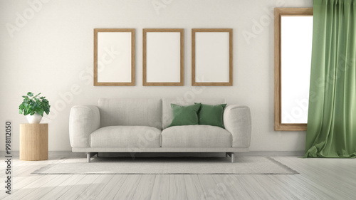 Modern living room with white sofa, green curtains and empty frames hanging on the wall