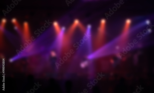 Blur image of red stage lights background.