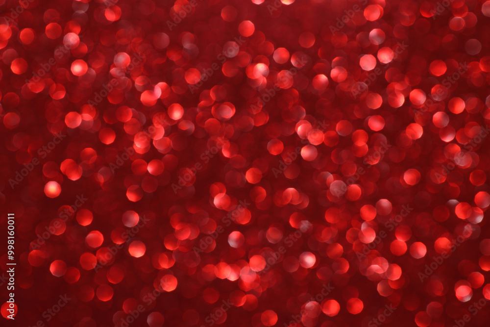 Red glitter bokeh background with sparkling light, abstract defocused texture. Holiday lights. Red glitter bokeh background with sparkling light, abstract defocused texture. Holiday lights.