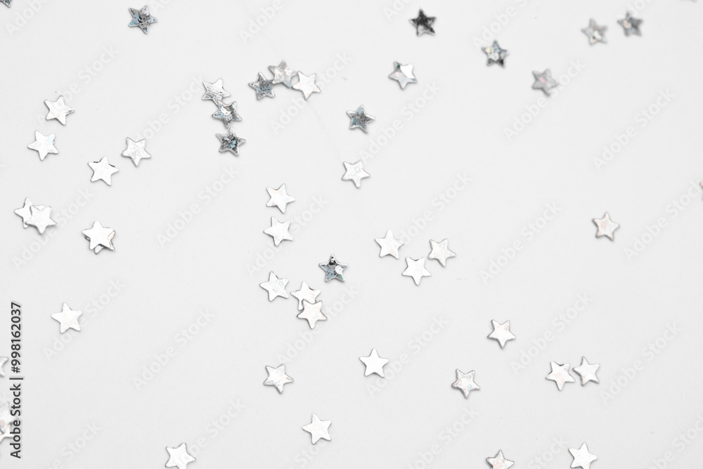 sparkles silver stars on white background with text place- Image sparkles silver stars on white background with text place- Image