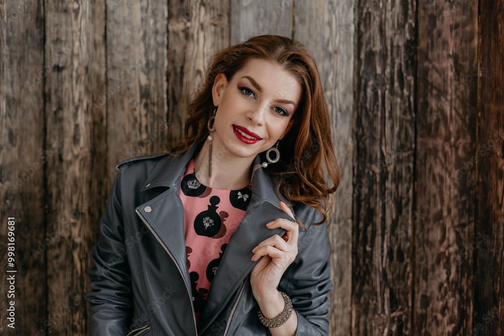 Fototapeta premium Chic Fashion Model Showcasing a Stylish and Trendy Outfit with Elegant Accessories
