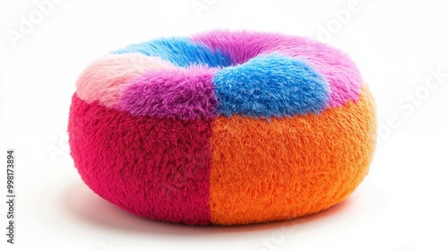 A colorful pouf used as a footrest, isolated on a white background