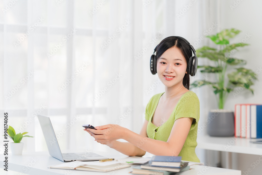 Obraz premium Smiling Woman Working From Home