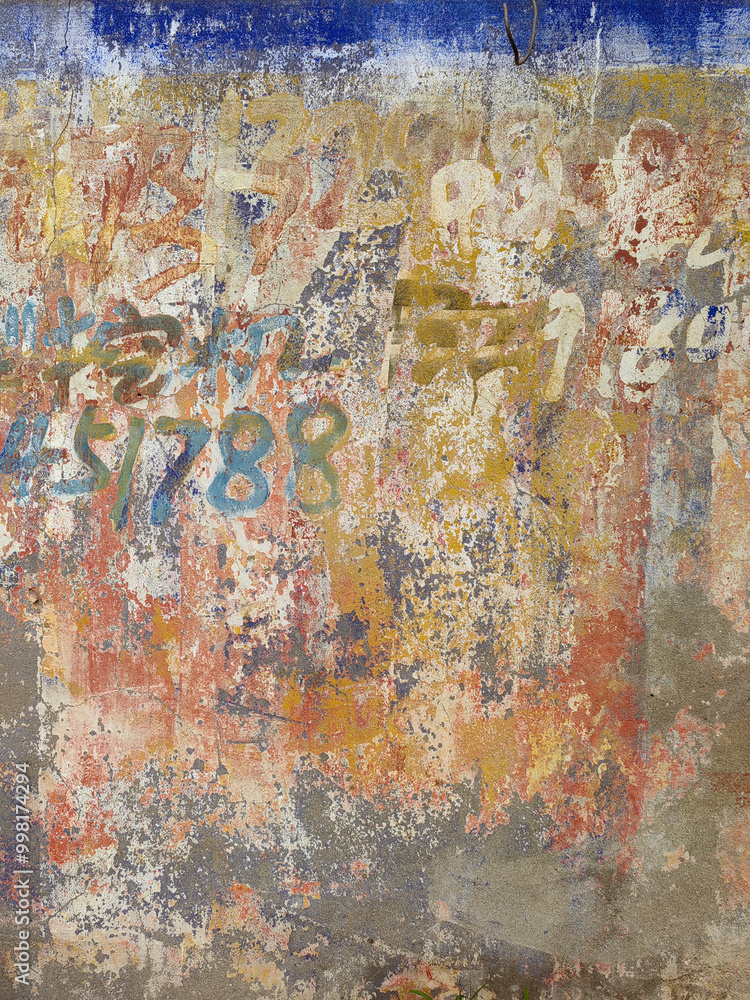 Old wall texture - rusty wall. Grunge background. Several layers of paint. Old wall texture - rusty wall. Grunge background. Several layers of paint.