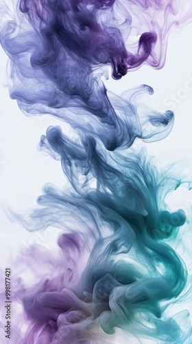 A swirling mass of pastel-colored ink in water, creating an abstract and dynamic visual effect on the white background.