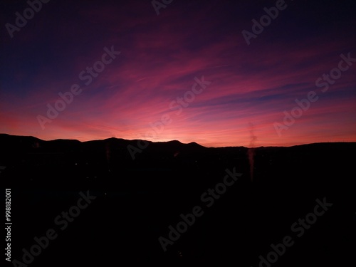 Blue, purple and pink sky background. Beautiful sky with clouds in pink, purple and blue background