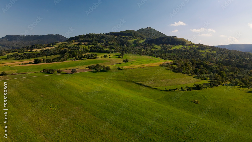 A flight above Dettingen Teck towards the Castle Teck which is located high above the mountain A flight above Dettingen Teck towards the Castle Teck which is located high above the mountain