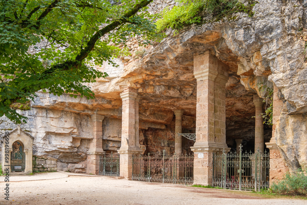 Naklejka premium A cave carved out of the cliff on the Chemin de Croix in the sacred village of Rocamadour in the Lot region of France