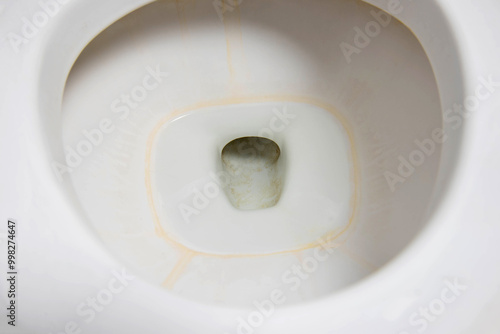 Dirty old uncleaned white toilet