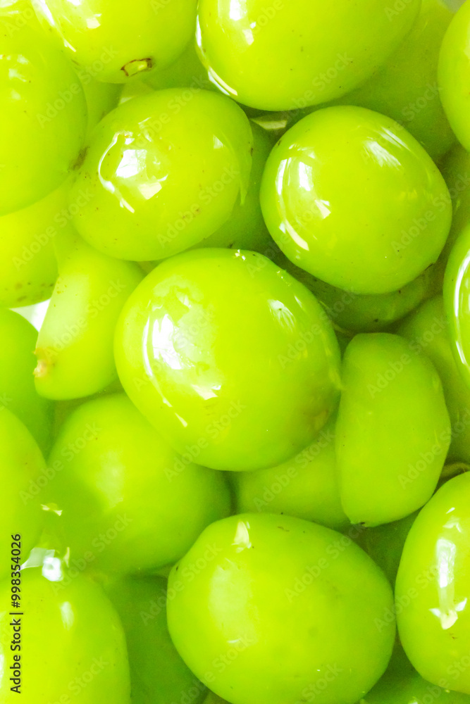 pile of green grapes as background.food background pile of green grapes as background.food background