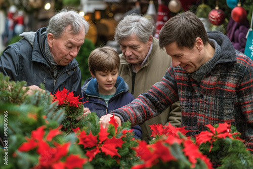 Multigenerational white family shopping for holiday wreaths at a traditional Christmas market