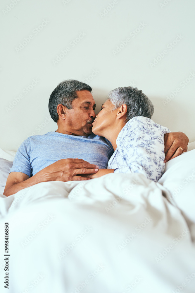 Relax, kiss and senior couple in bed with cuddle for loyalty, support and connection in marriage. Elderly people, love and affection at home for retirement romance, commitment and bonding on weekend Relax, kiss and senior couple in bed with cuddle for loyalty, support and connection in marriage. Elderly people, love and affection at home for retirement romance, commitment and bonding on weekend
