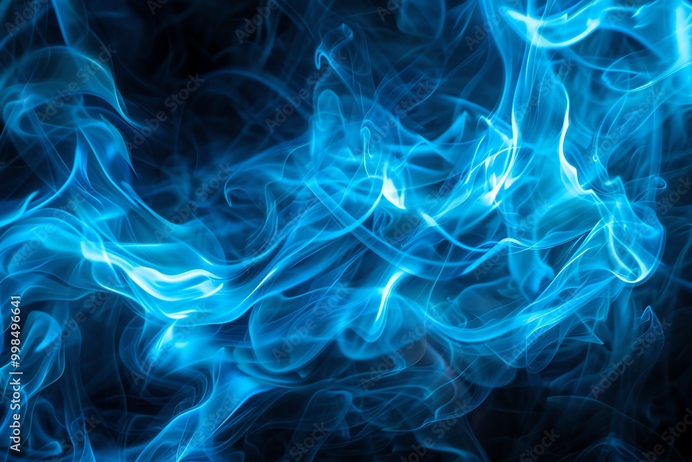 A mesmerizing swirl of vibrant blue smoke, creating an ethereal and dynamic visual effect against a dark background. A mesmerizing swirl of vibrant blue smoke, creating an ethereal and dynamic visual effect against a dark background.