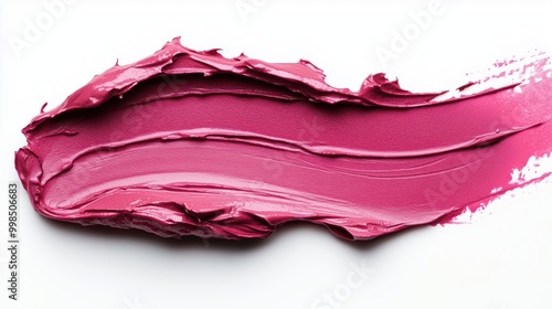 Highly detailed magenta cosmetic smear resembling a bold brushstroke on a white background, ideal for beauty ads.