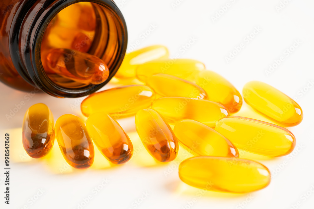 Fish oil capsules omega 3 vitamin with EPA and DHA on white background. Fish oil capsules omega 3 vitamin with EPA and DHA on white background.