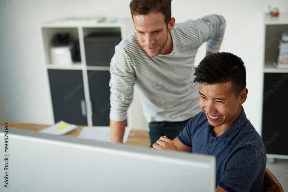 Fototapeta premium Team, business men or training on computer for help, creative or review on post production software. Smile, coaching or mentor teaching intern for video editing project, advice or feedback in startup
